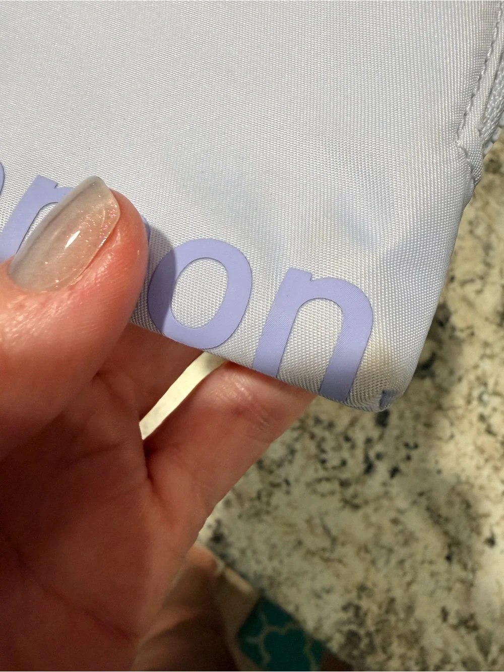 lululemon light lavender zip pouch with gold hardware